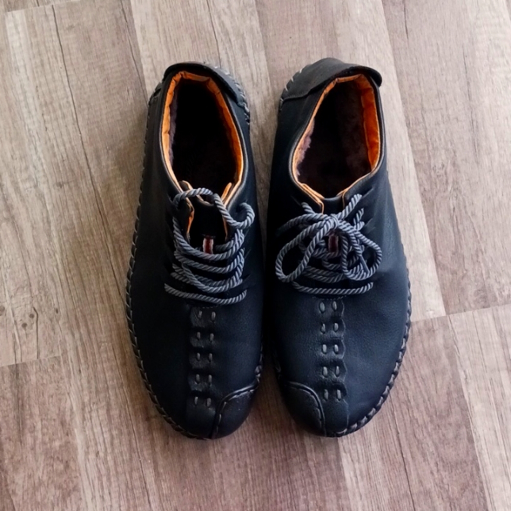 Men's faux fur lined leather moccasins.